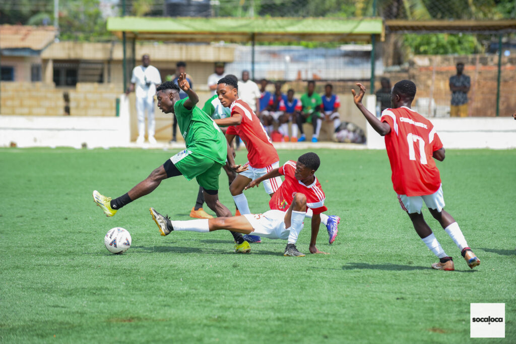 Football players from Changing Lives FC vs Mighty Fortress